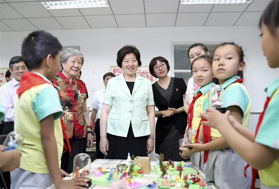 CHINA-BEIJING-SUN CHUNLAN-CHILDREN-VISIT (CN)