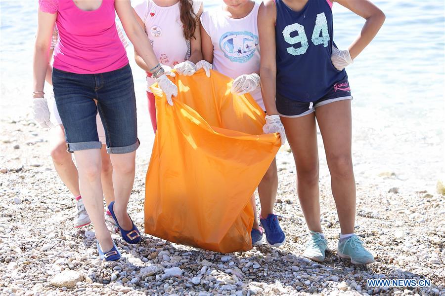 GREECE-PIRAEUS-BEACH CLEANING