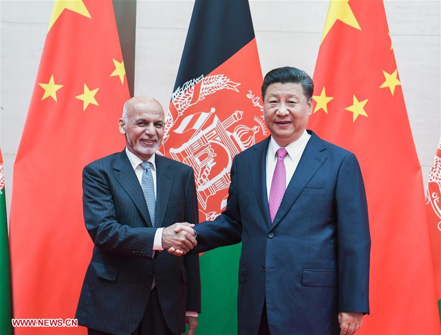 (SCO SUMMIT) CHINA-QINGDAO-XI JINPING-AFGHANISTAN-ASHRAF GHANI-MEETING (CN)