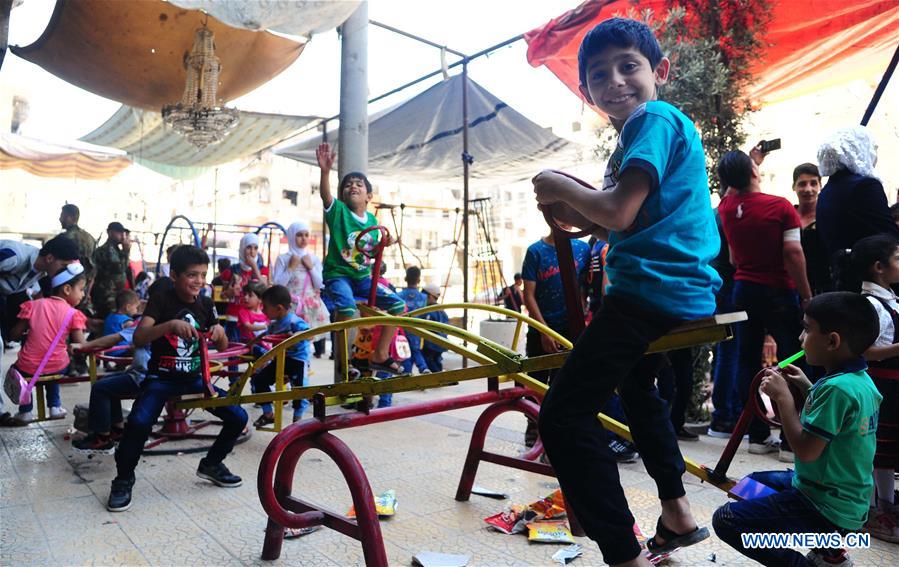 SYRIA-DAMASCUS-CHILDREN-EID-FEATURE