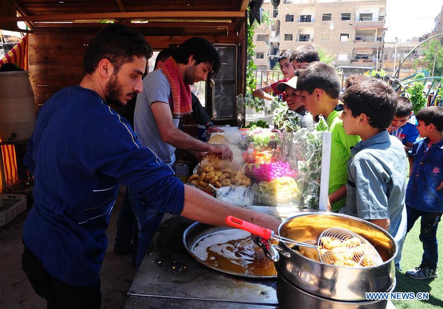 SYRIA-DAMASCUS-CHILDREN-EID-FEATURE