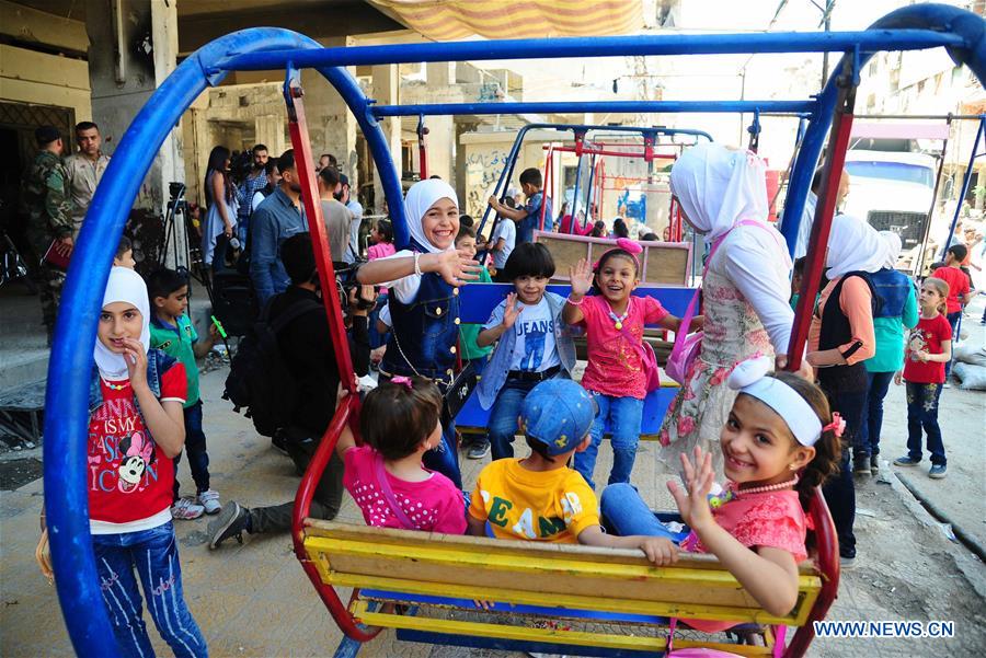 SYRIA-DAMASCUS-CHILDREN-EID-FEATURE