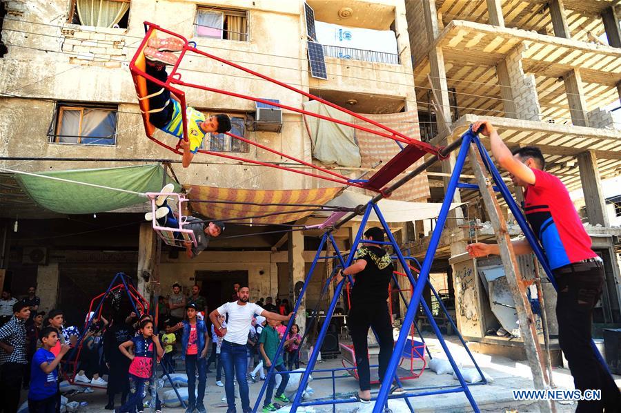SYRIA-DAMASCUS-CHILDREN-EID-FEATURE