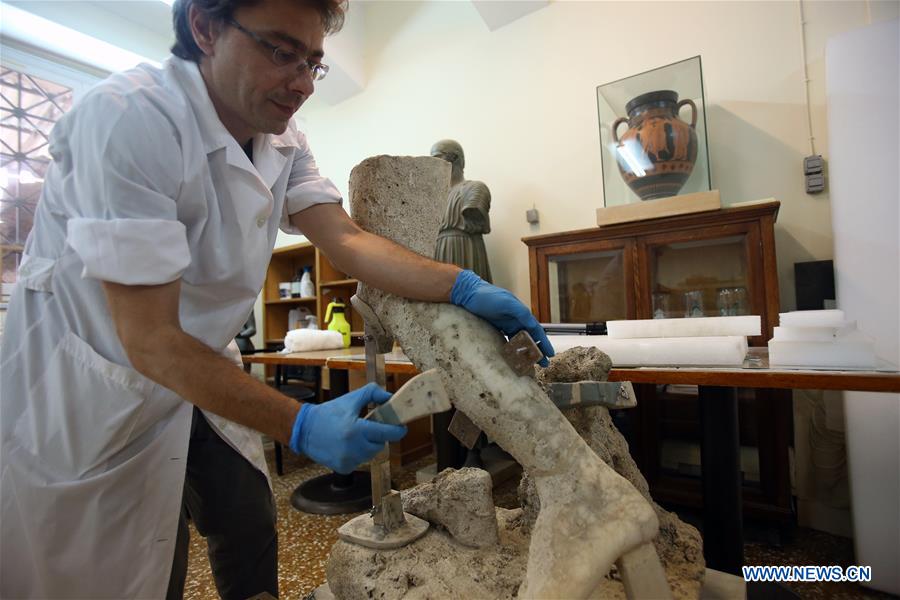 GREECE-ATHENS NATIONAL ARCHAEOLOGICAL MUSEUM-CONSERVATORS