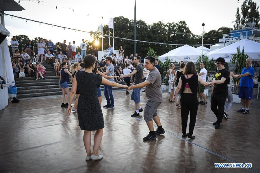 hat spids reference People attend West Coast Swing dancing lesson in Warsaw, Poland - Xinhua |  English.news.cn