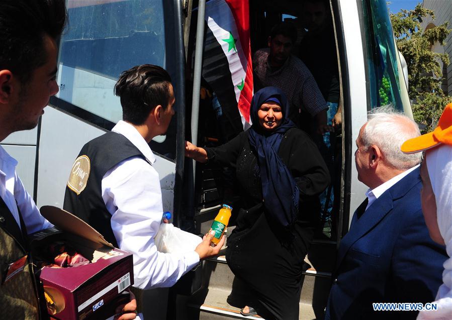 SYRIA-DAMASCUS-REFUGEES-RETURN-FROM-LEBANON