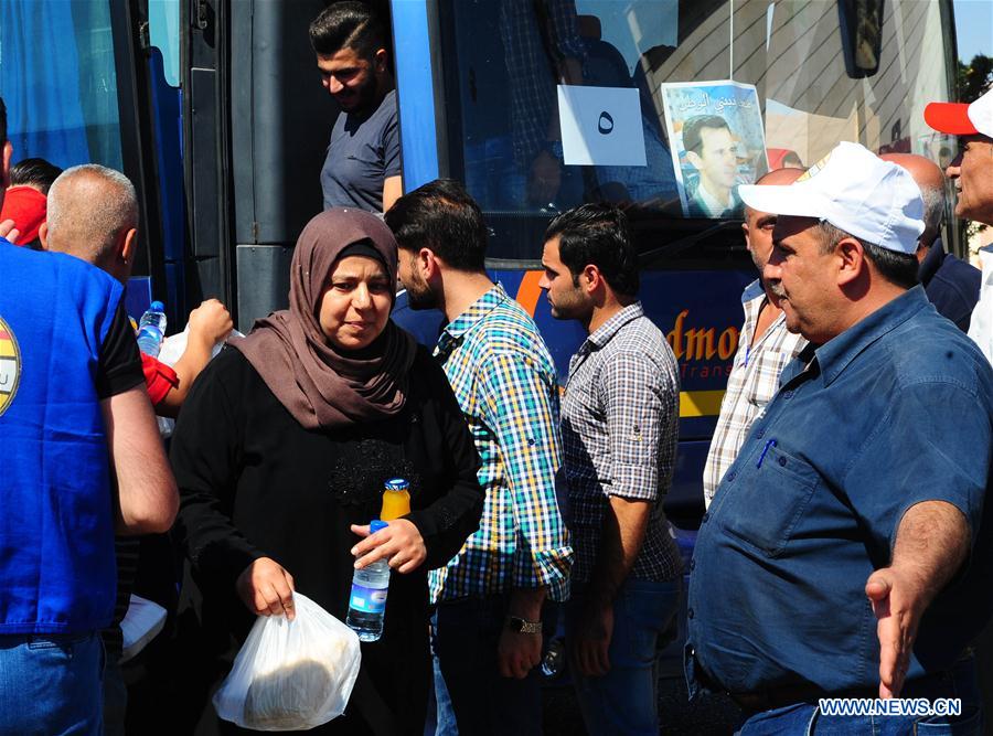 SYRIA-DAMASCUS-REFUGEES-RETURN-FROM-LEBANON