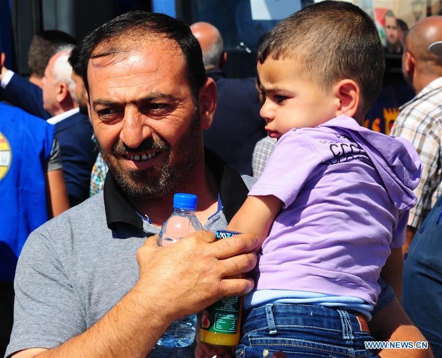 SYRIA-DAMASCUS-REFUGEES-RETURN-FROM-LEBANON