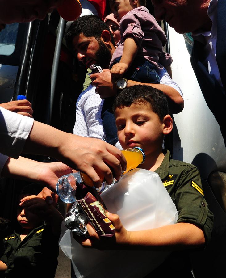 SYRIA-DAMASCUS-REFUGEES-RETURN-FROM-LEBANON