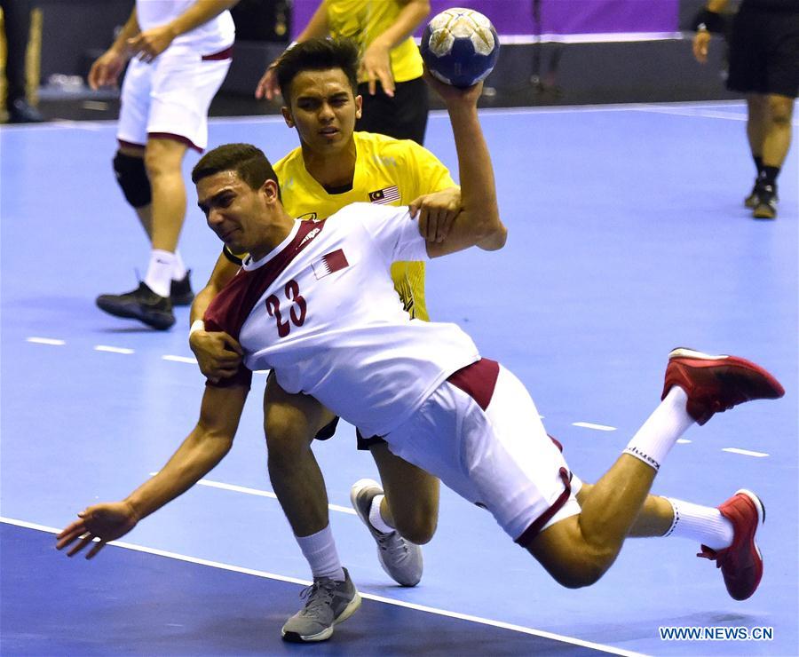 Qatar beats Malaysia 6411 during first round of handball game at Asian