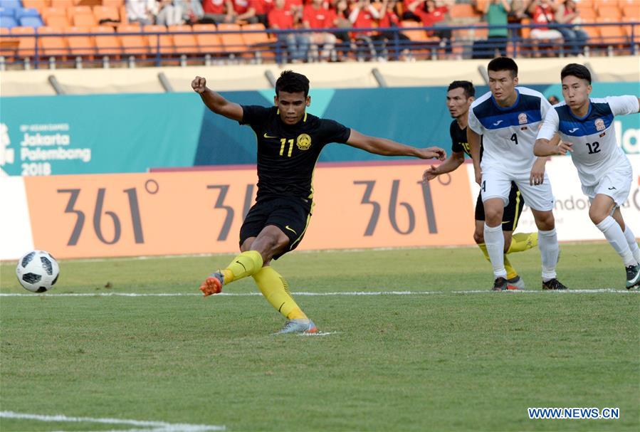 (SP)INDONESIA-BANDUNG-ASIAN GAMES-FOOTBALL-KYRGYZSTAN VS MALAYSIA