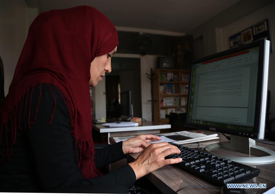 AFGHANISTAN-KABUL-FEMALE JOURNALIST-NEWSPAPER