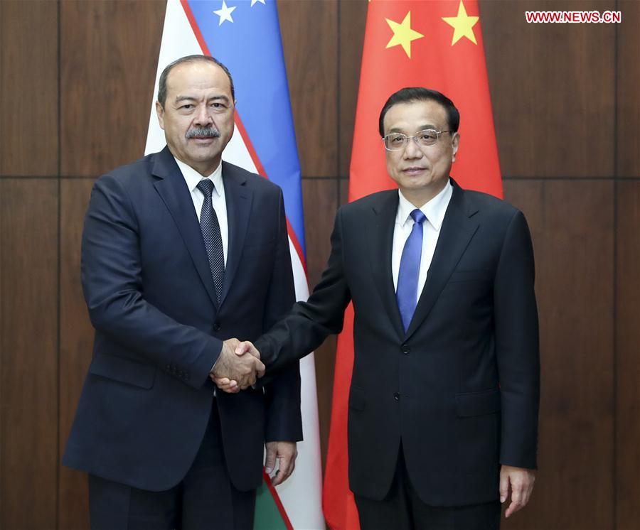 TAJIKISTAN-DUSHANBE-LI KEQIANG-UZBEK PM-MEETING