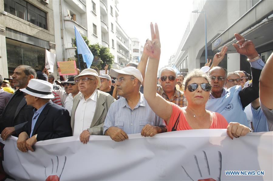 People participate in rally in Casablanca, Moro