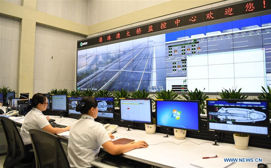 Xinhua Headlines: World's longest cross-sea bridge opens, integrating China's Greater Bay Area
