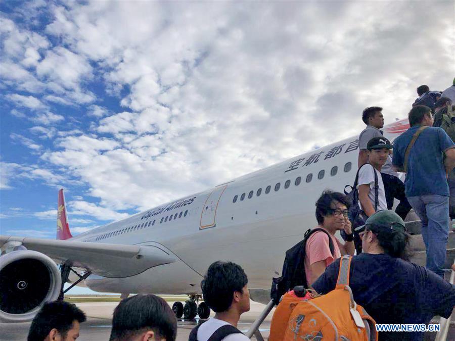 NORTHERN MARIANA ISLANDS-SAIPAN-CHINESE TRAPPED TOURISTS-FLY BACK HOME 