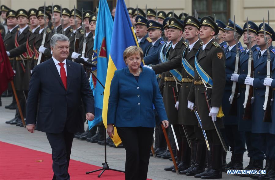 UKRAINE-KIEV-POROSHENKO-MERKEL-POLITICS