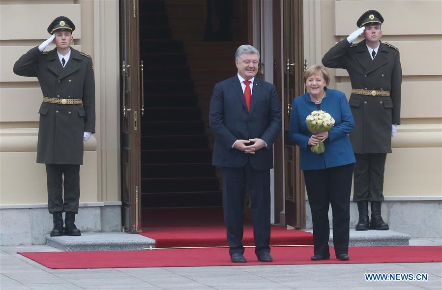 UKRAINE-KIEV-POROSHENKO-MERKEL-POLITICS