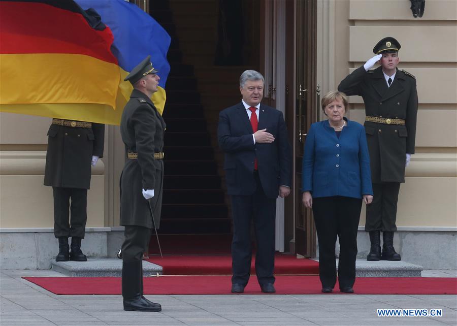 UKRAINE-KIEV-POROSHENKO-MERKEL-POLITICS