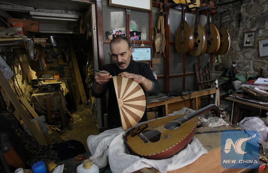 Feature: Palestinian mends, makes 5,000-year-old music instrument