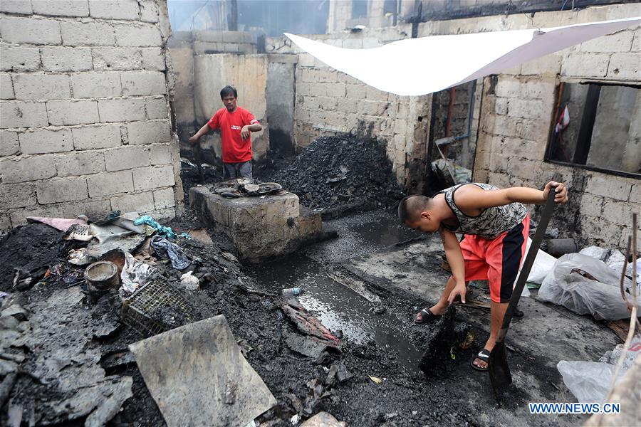 THE PHILIPPINES-QUEZON CITY-FIRE-AFTERMATH