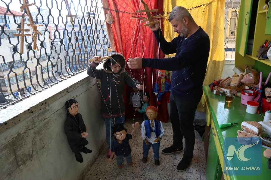 Feature: Palestinian artist makes marionettes to promote puppet theater in  Gaza - Xinhua