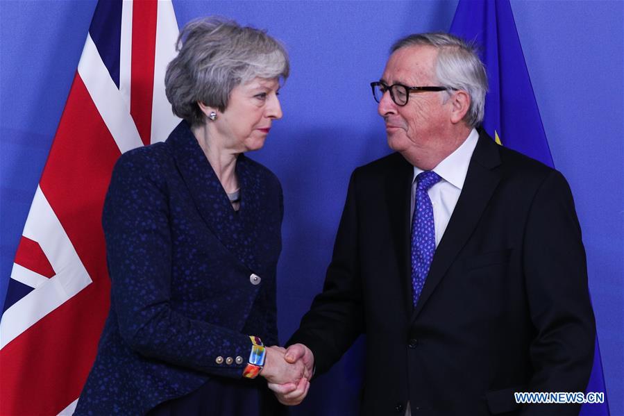 BELGIUM-BRUSSELS-EU-BRITAIN-JUNCKER-THERESA MAY
