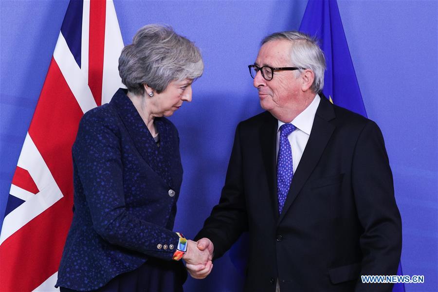 BELGIUM-BRUSSELS-EU-BRITAIN-JUNCKER-THERESA MAY