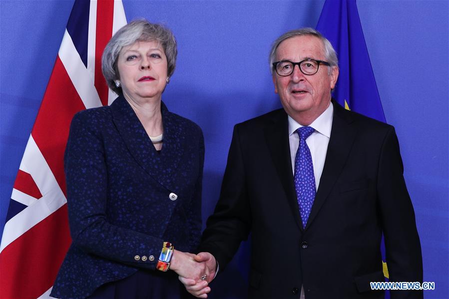 BELGIUM-BRUSSELS-EU-BRITAIN-JUNCKER-THERESA MAY