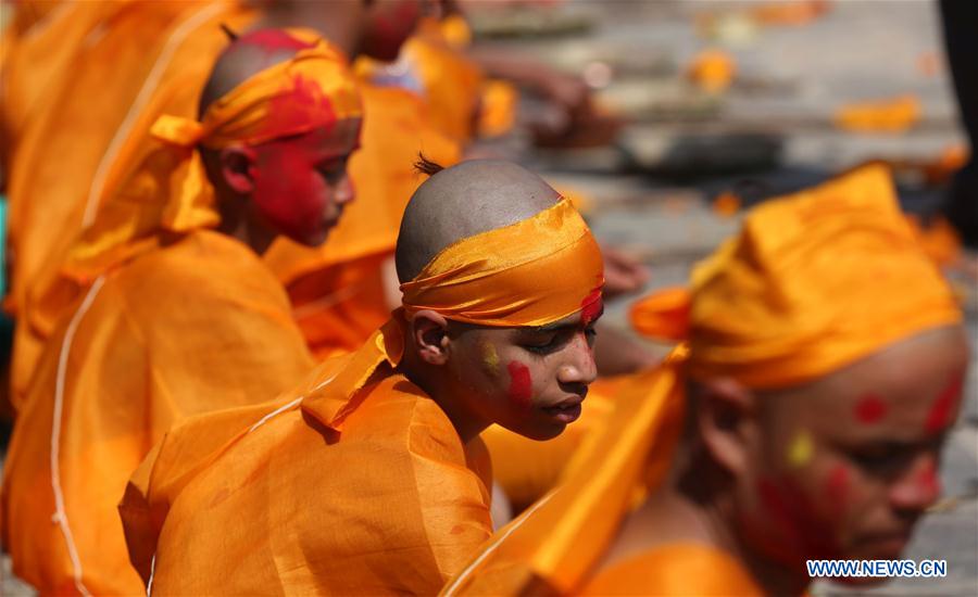 Hindu boys attend religious rituals during Bratabandha ceremony in