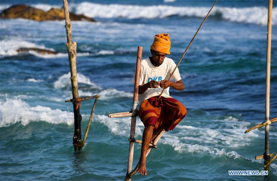SRI LANKA-GALLE-STILT FISHING