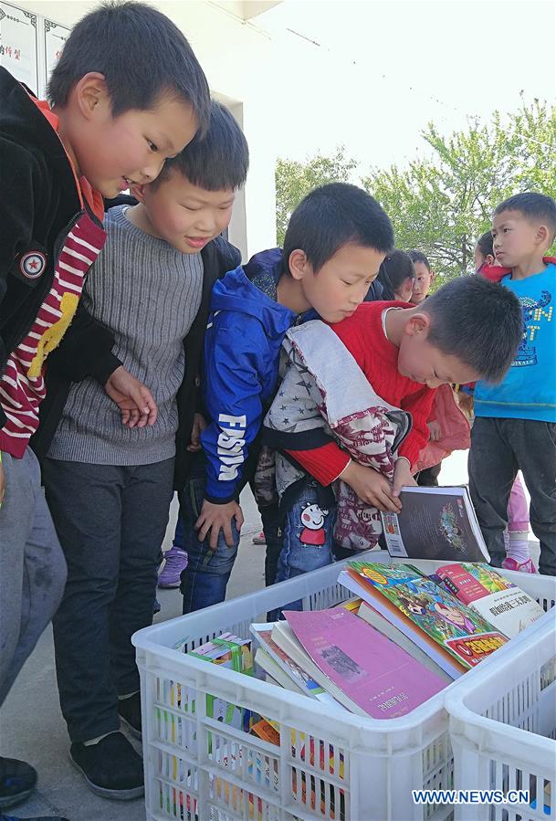 Over 600 books donated to pupils in mountainous area in E China's Anhui