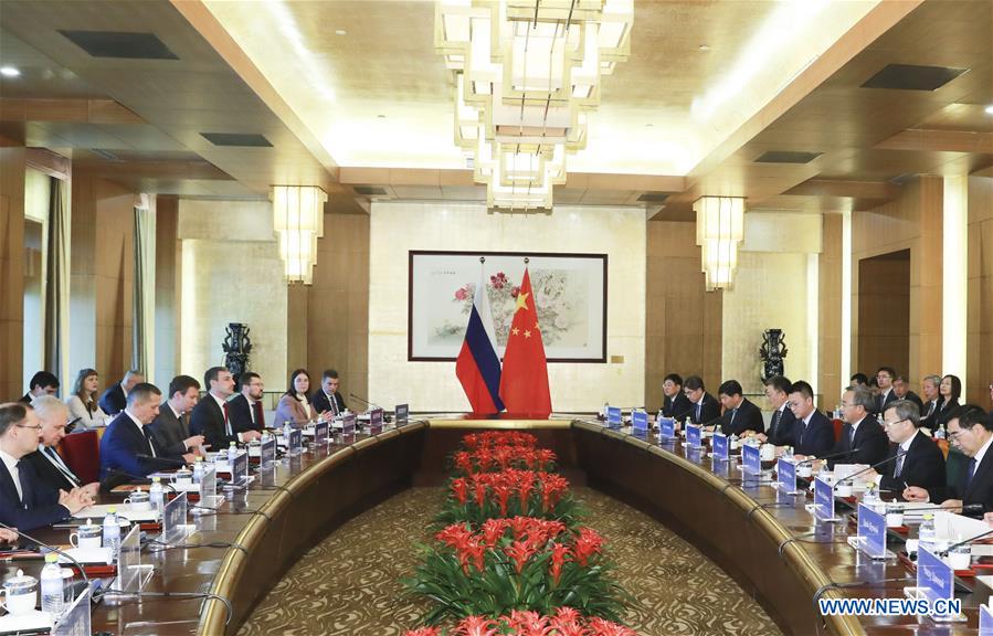 (BRF)CHINA-BEIJING-HU CHUNHUA-RUSSIA-TRUTNEV-MEETING (CN)