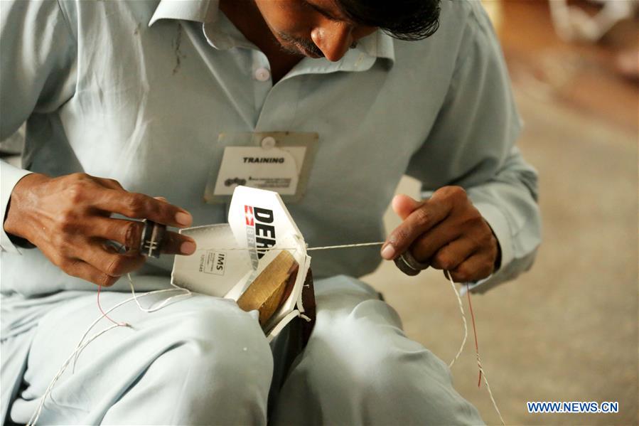 PAKISTAN-SIALKOT-ECONOMY-FOOTBALL-MANUFACTURING