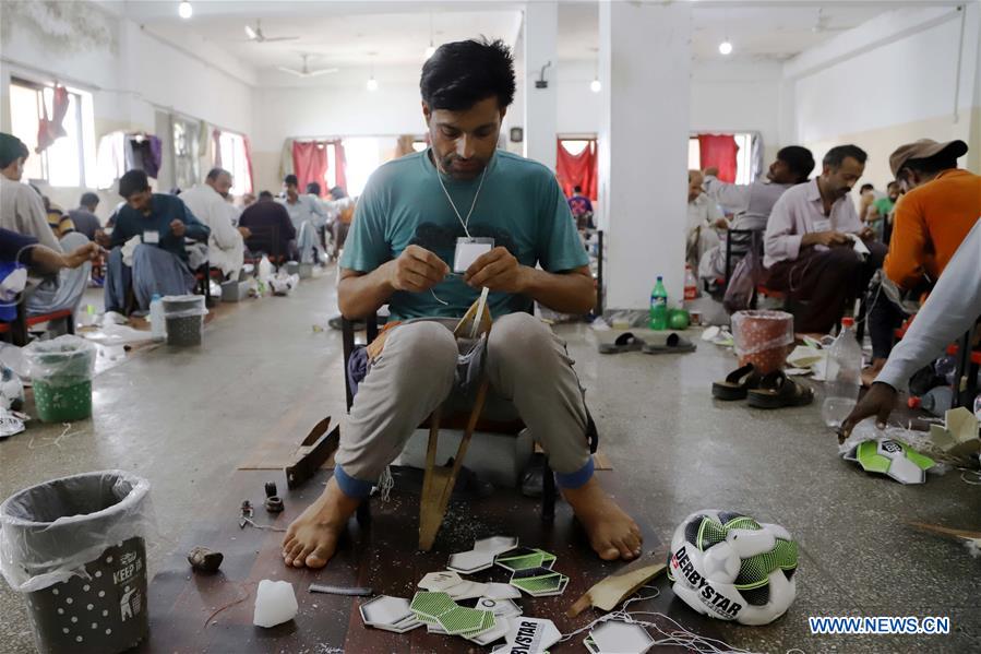 PAKISTAN-SIALKOT-ECONOMY-FOOTBALL-MANUFACTURING