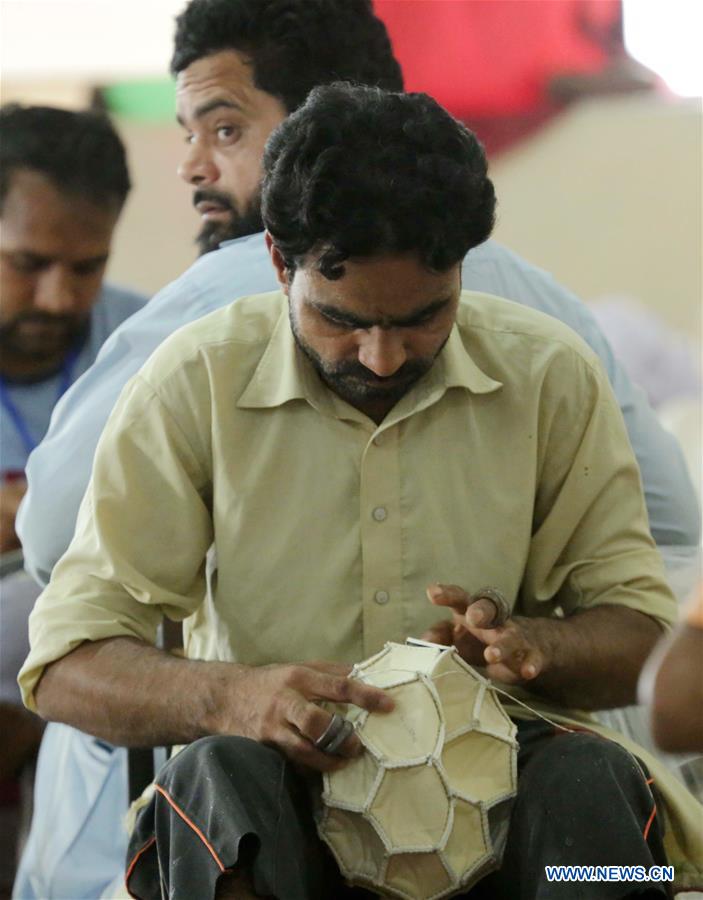 PAKISTAN-SIALKOT-ECONOMY-FOOTBALL-MANUFACTURING