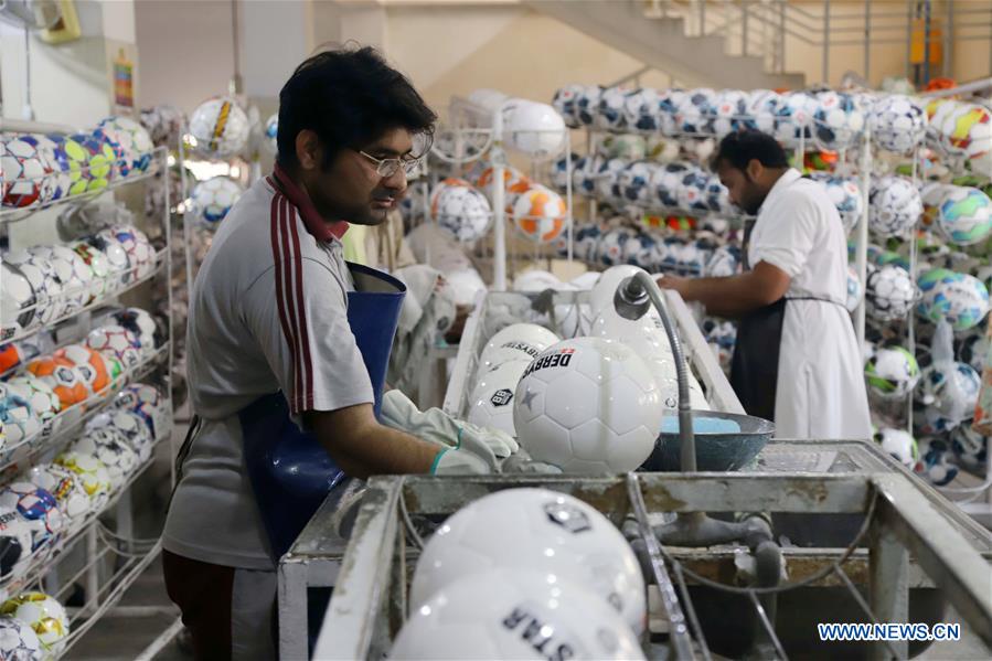 In pics football factory in eastern Pakistan's Sialkot Xinhua