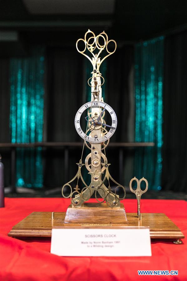 Horological exhibition show time, place via ticking of clocks in