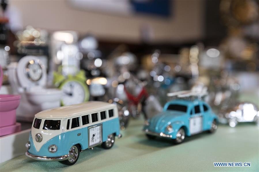 Horological exhibition show time, place via ticking of clocks in