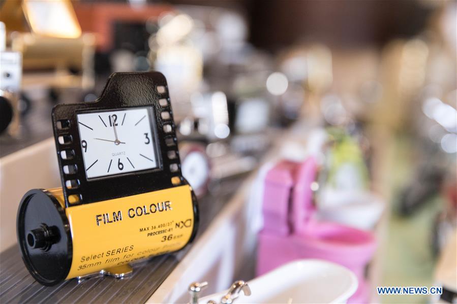 Horological exhibition show time, place via ticking of clocks in