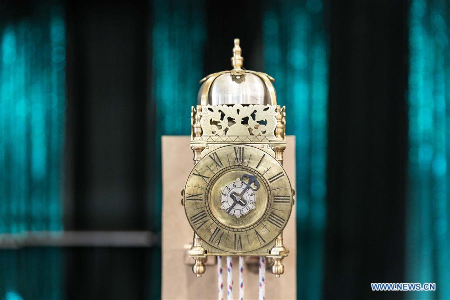 Horological exhibition show time, place via ticking of clocks in