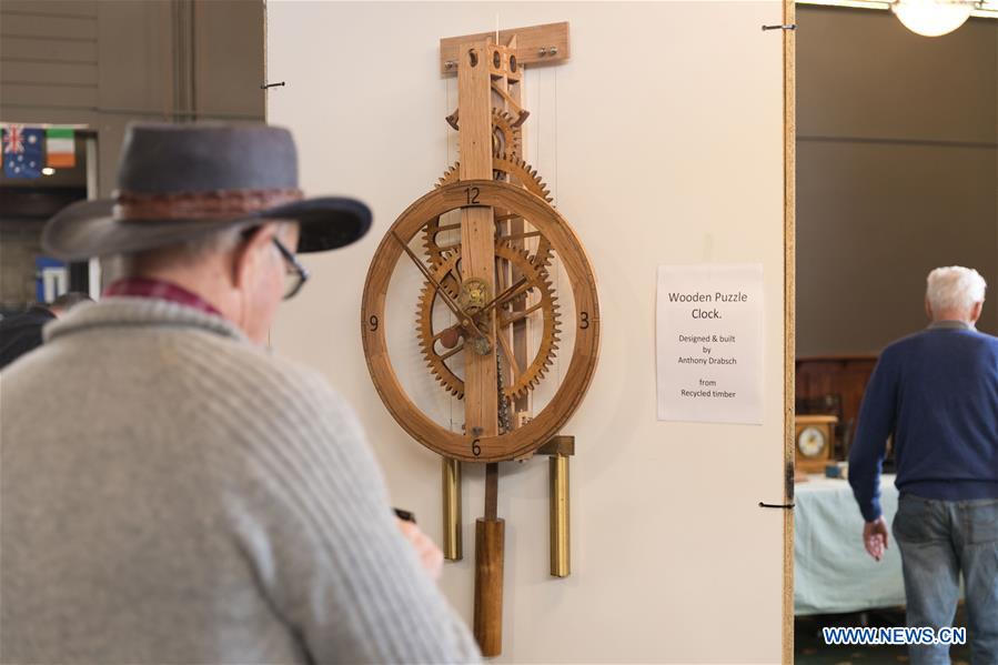 Horological exhibition show time, place via ticking of clocks in