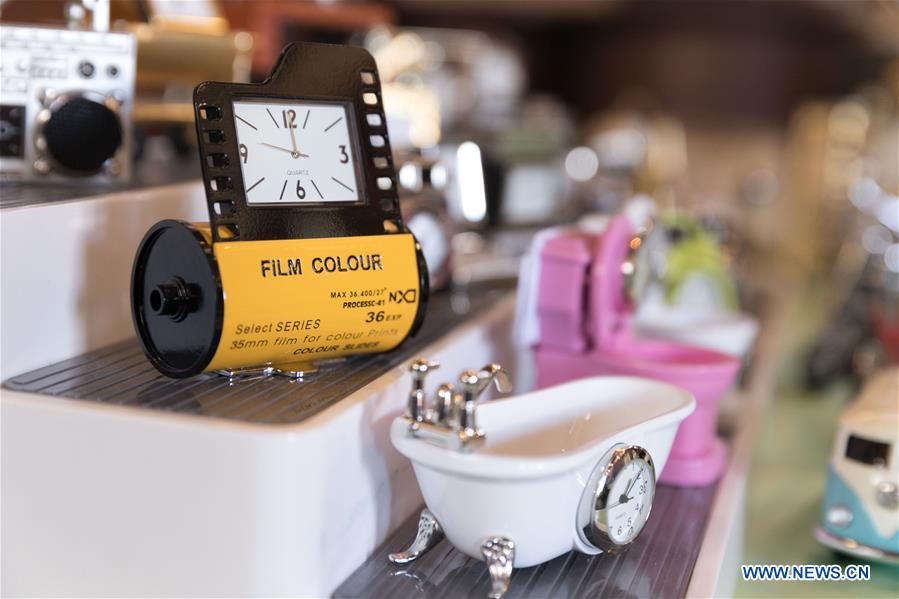 Horological exhibition show time, place via ticking of clocks in