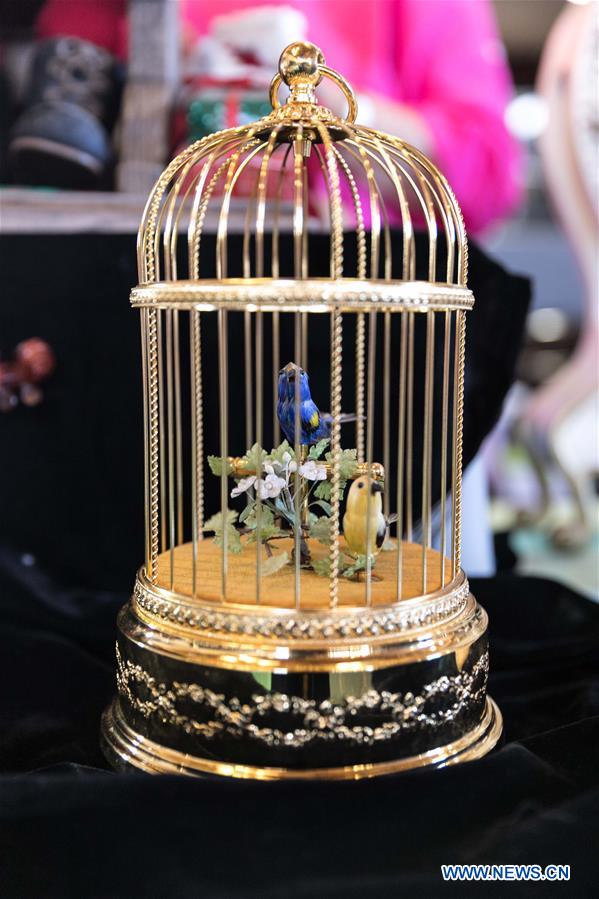 Horological exhibition show time, place via ticking of clocks in