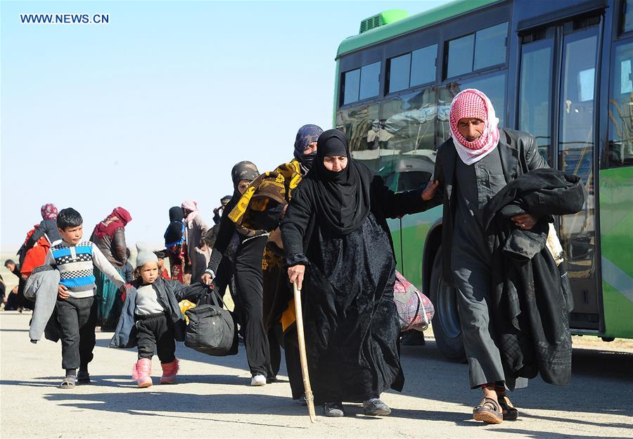 SYRIA-HOMS-REFUGEES-RETURN