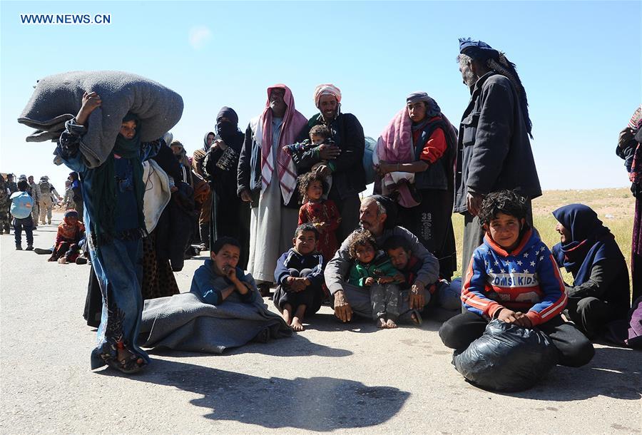 SYRIA-HOMS-REFUGEES-RETURN