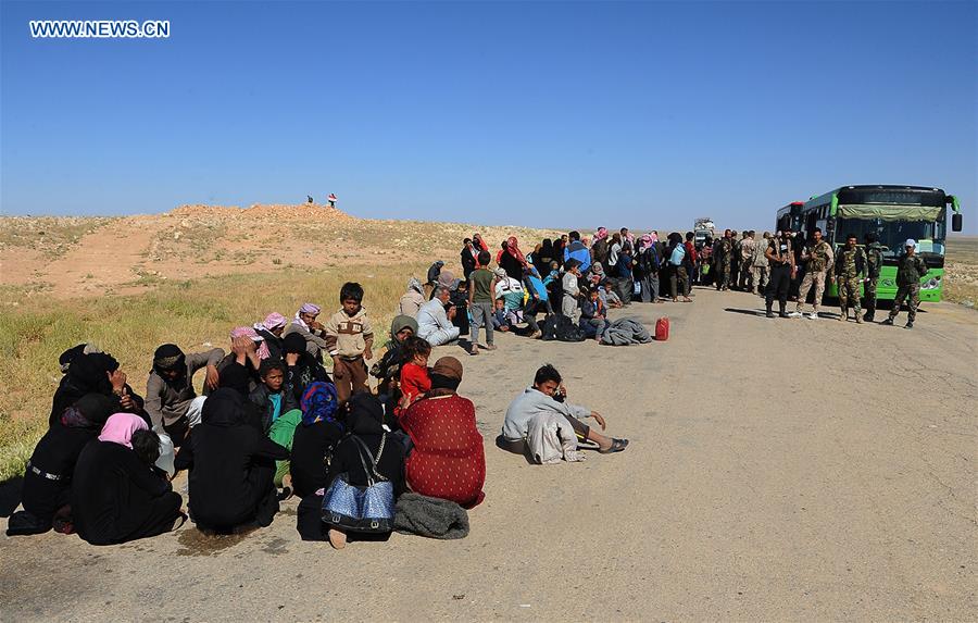 SYRIA-HOMS-REFUGEES-RETURN