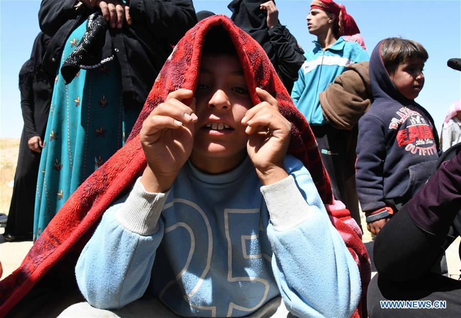 SYRIA-HOMS-REFUGEES-RETURN