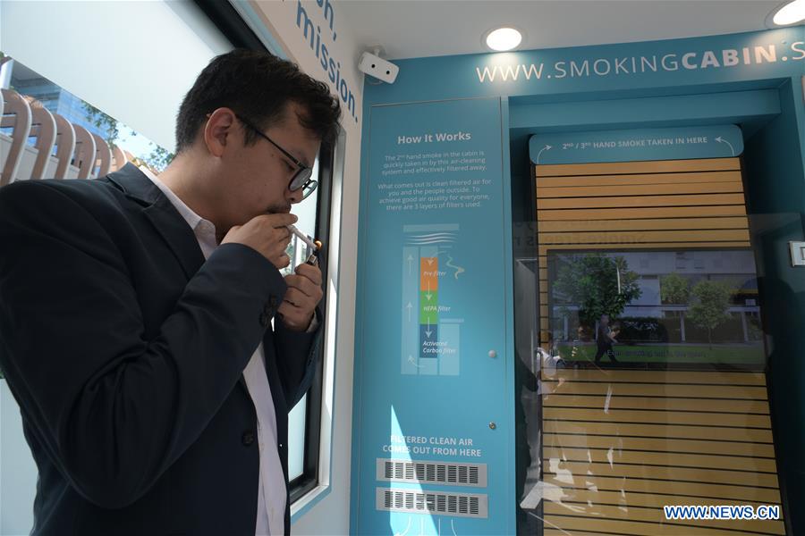 Singapore launches first smoking cabin Xinhua English.news.cn