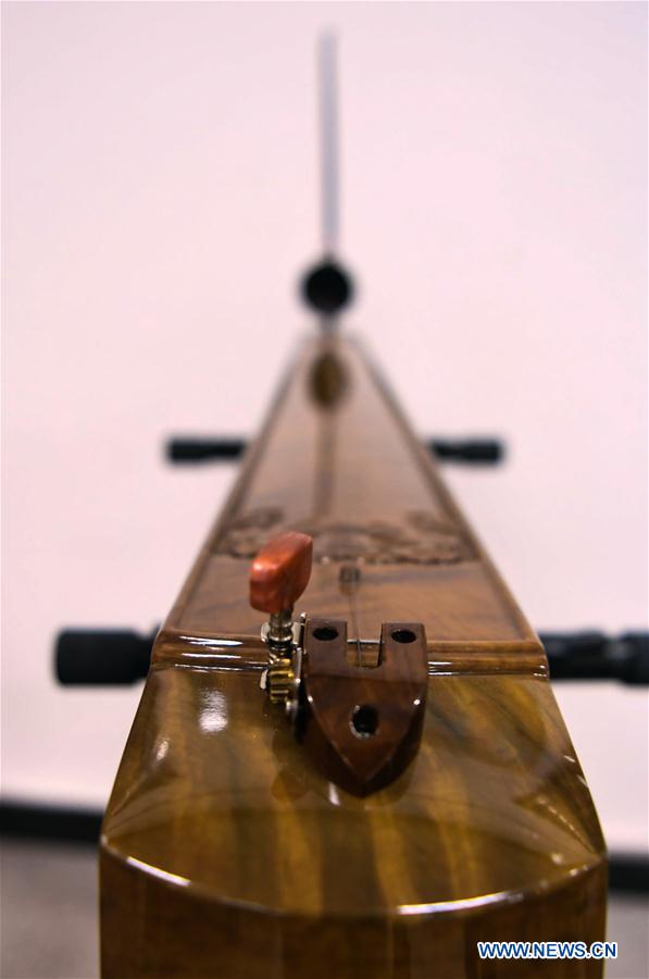 CHINA-GUANGXI-JING ETHNIC GROUP-SINGLE-STRING INSTRUMENT (CN)